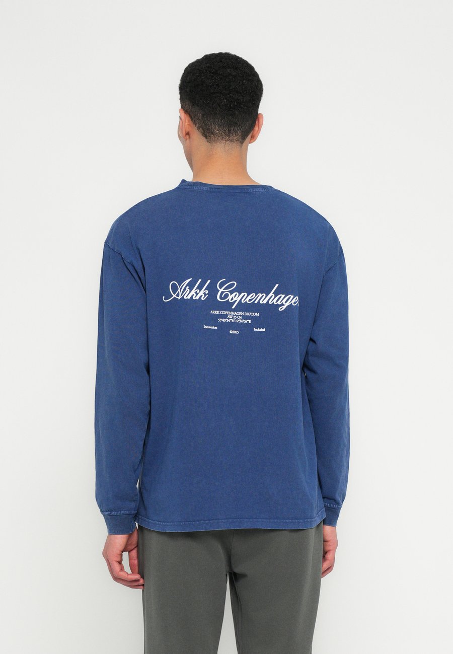 Топ ARKK Copenhagen UNISEX, Vintage Blue/Blue
Топ ARKK Copenhagen UNISEX, Vintage Blue/Blue