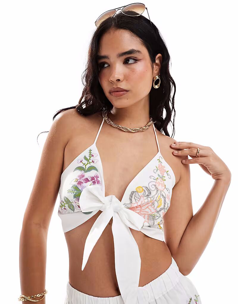 Белый топ с цветочной вышивкой и завязкой спереди от ASOS DESIGN
Белый топ с цветочной вышивкой и завязкой спереди от ASOS DESIGN