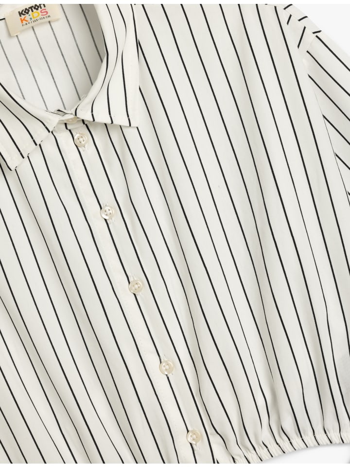 Синяя полосатая рубашка KOTON
Синяя полосатая рубашка KOTON