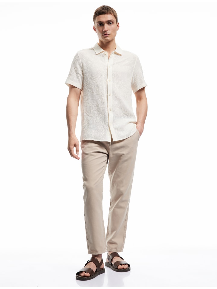 Брюки бежевого цвета KOTON
Брюки бежевого цвета KOTON