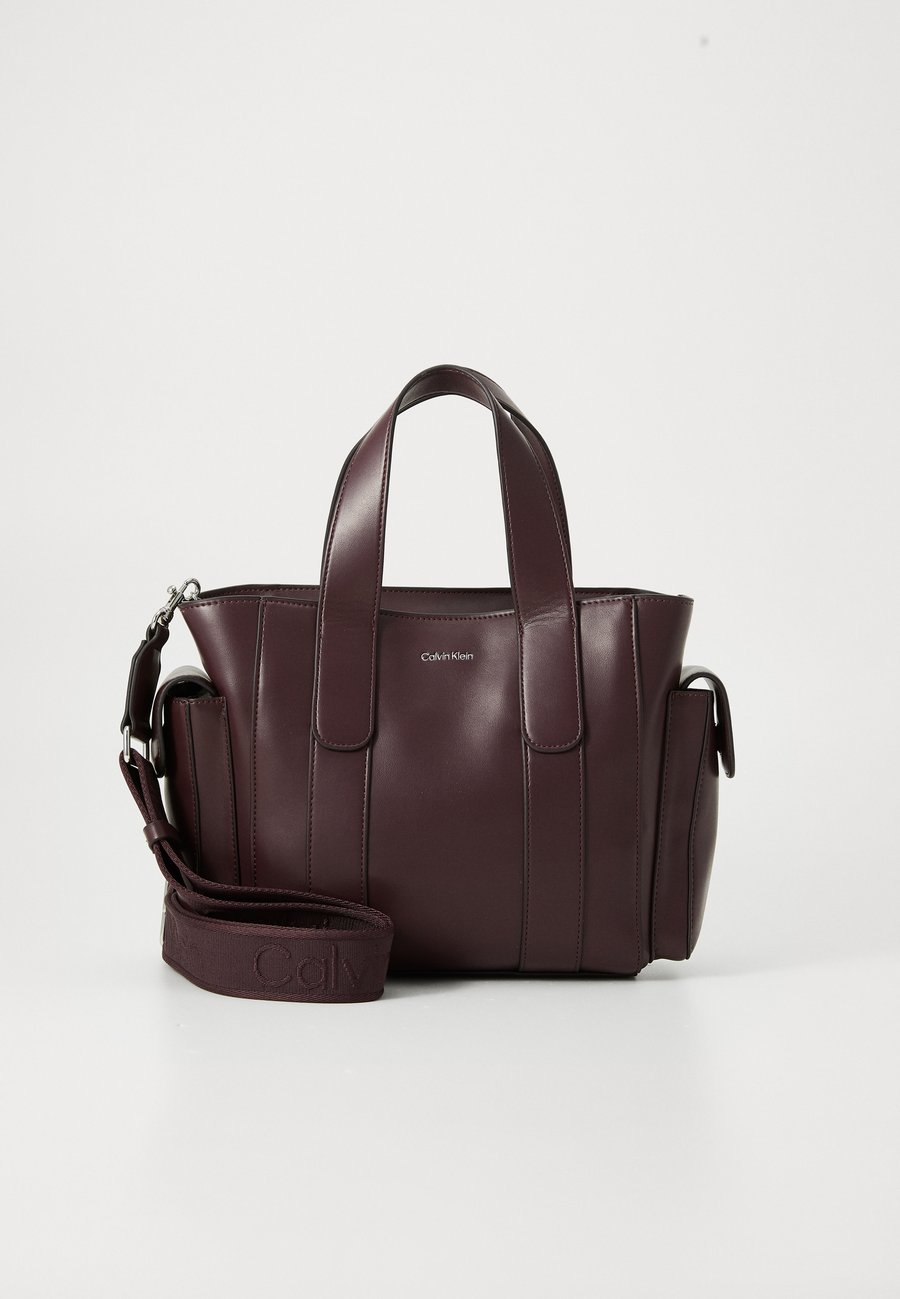 Сумка Calvin Klein Handbag, Fudge/Dark Brown
Сумка Calvin Klein Handbag, Fudge/Dark Brown
