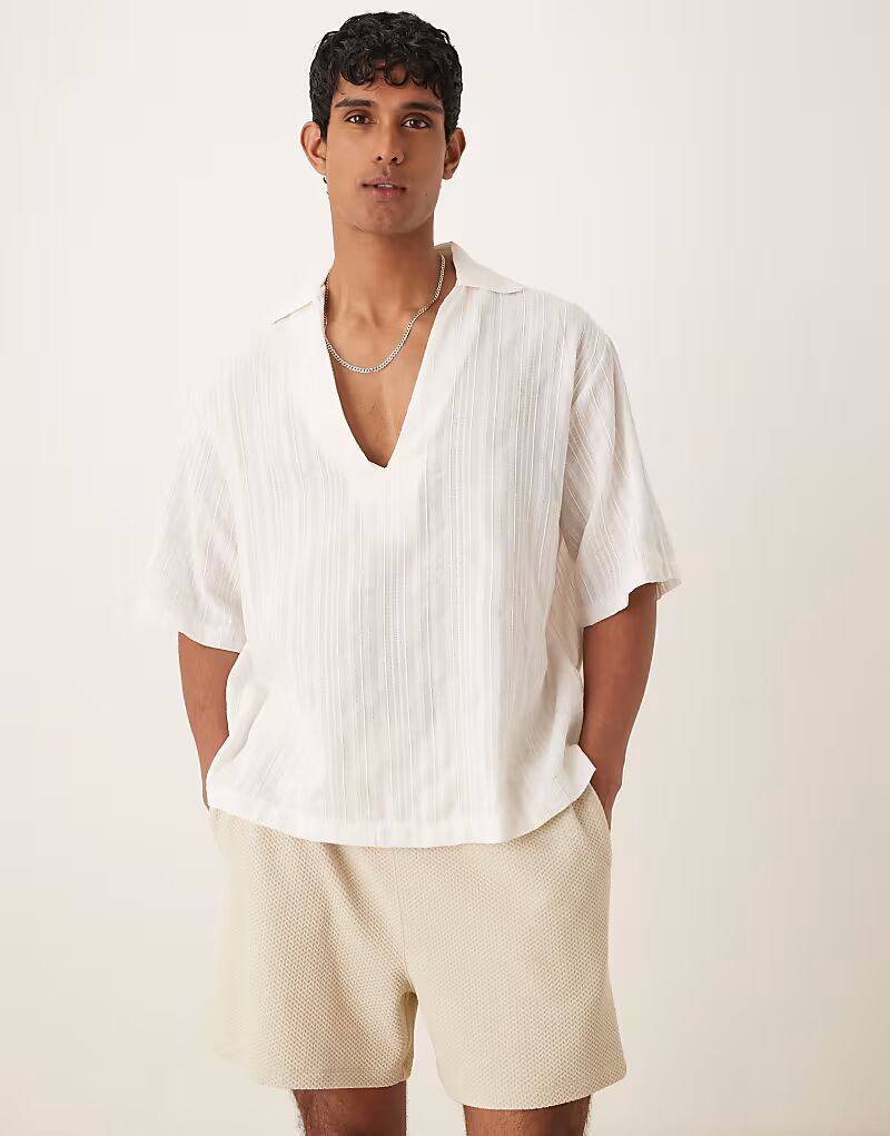 Рубашка свободного кроя ASOS DESIGN из легкой белой фактуры
Рубашка свободного кроя ASOS DESIGN из легкой белой фактуры