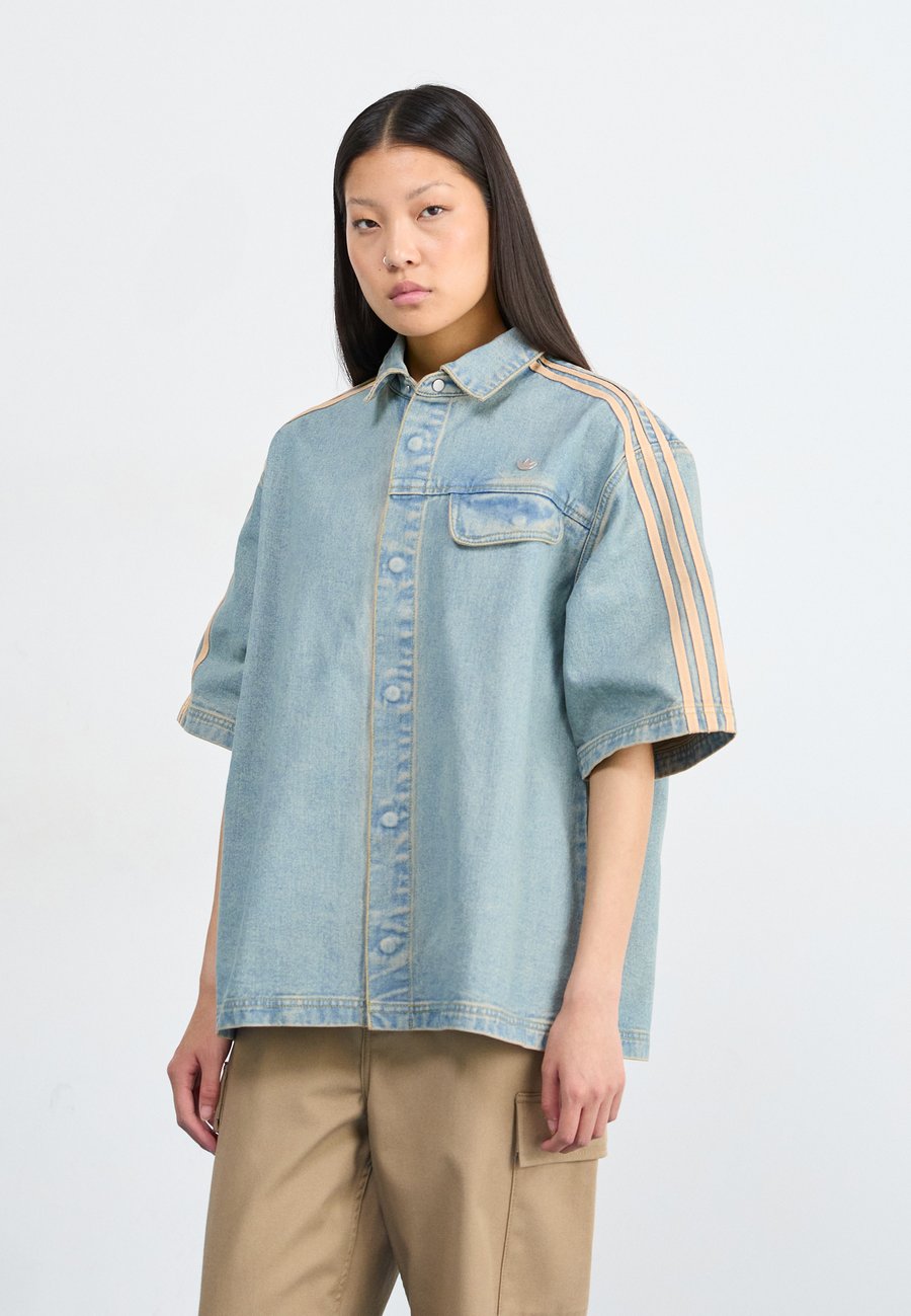 Блуза Adidas Originals Button-down blouse, Indigo Denim/Light-Blue Denim
Блуза Adidas Originals Button-down blouse, Indigo Denim/Light-Blue Denim