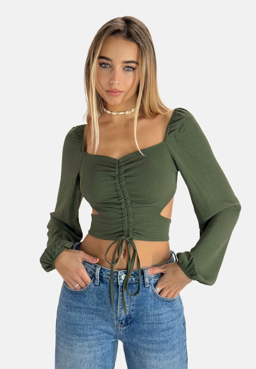 Блуза Elara Blouse, Grün/Khaki
Блуза Elara Blouse, Grün/Khaki