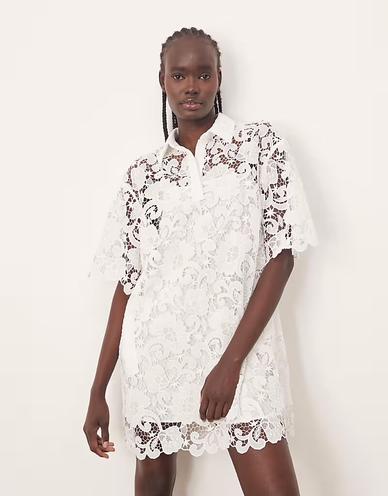 ARRANGE кружевное мини-платье-поло белого цвета
ARRANGE кружевное мини-платье-поло белого цвета