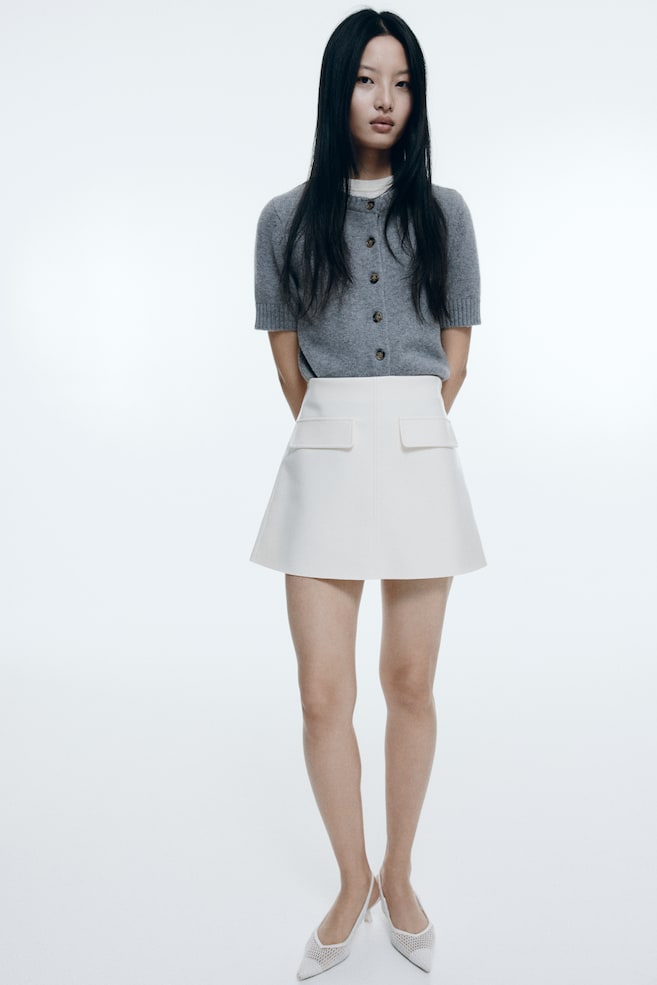 Шерстяной кардиган с короткими рукавами H&M, серый
Шерстяной кардиган с короткими рукавами H&M, серый