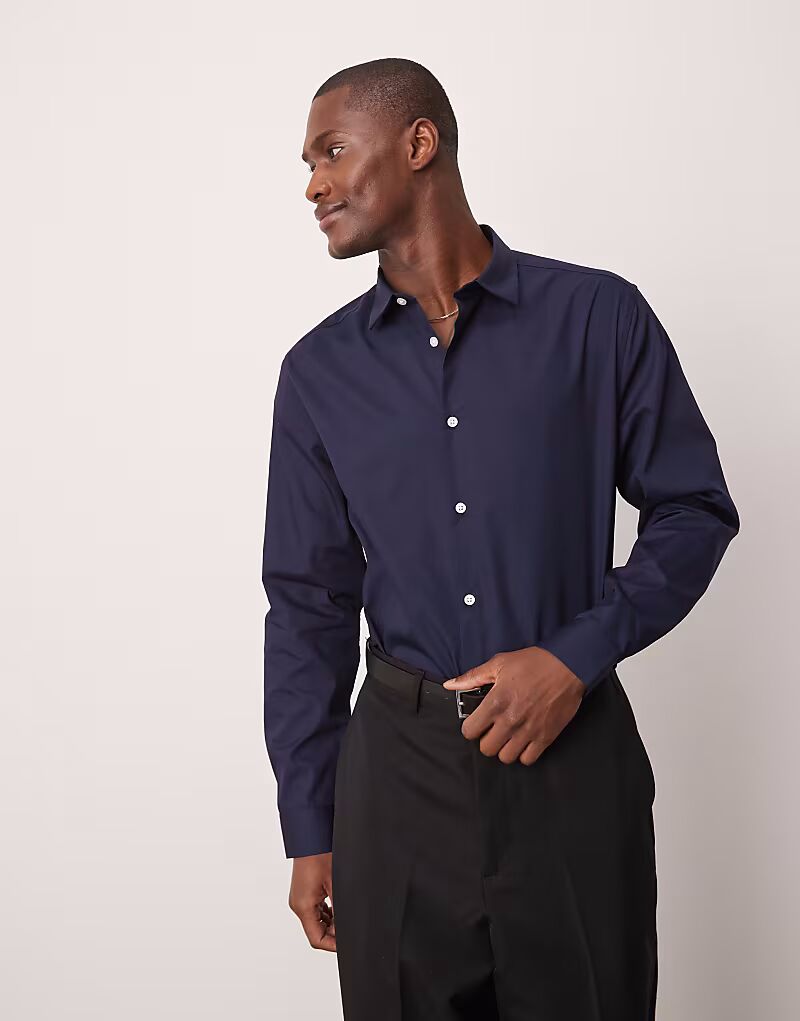 ASOS DESIGN формальная рубашка из поплина, легкая в утюжке, темно-синего цвета
ASOS DESIGN формальная рубашка из поплина, легкая в утюжке, темно-синего цвета