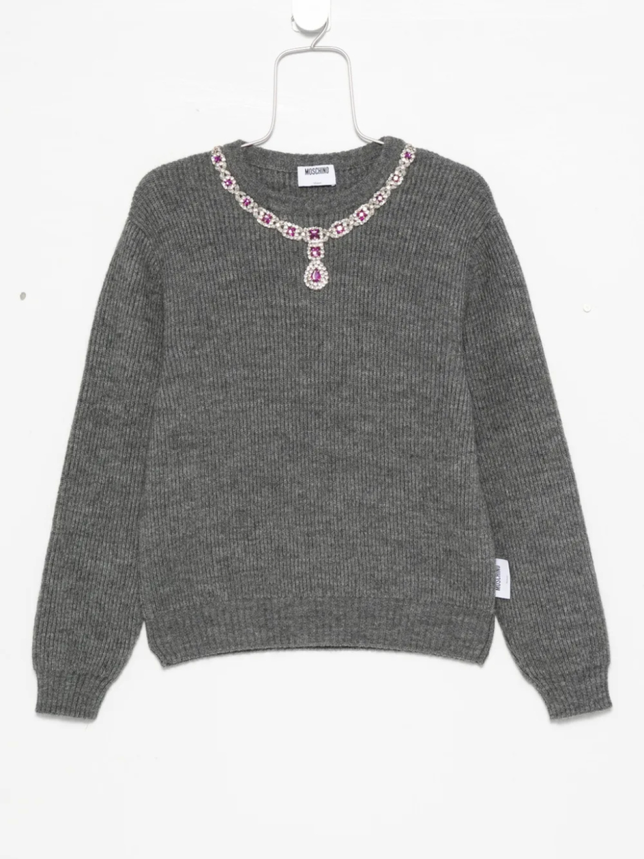 Ребристый свитер Moschino, украшенный драгоценными камнями, серый
Ребристый свитер Moschino, украшенный драгоценными камнями, серый