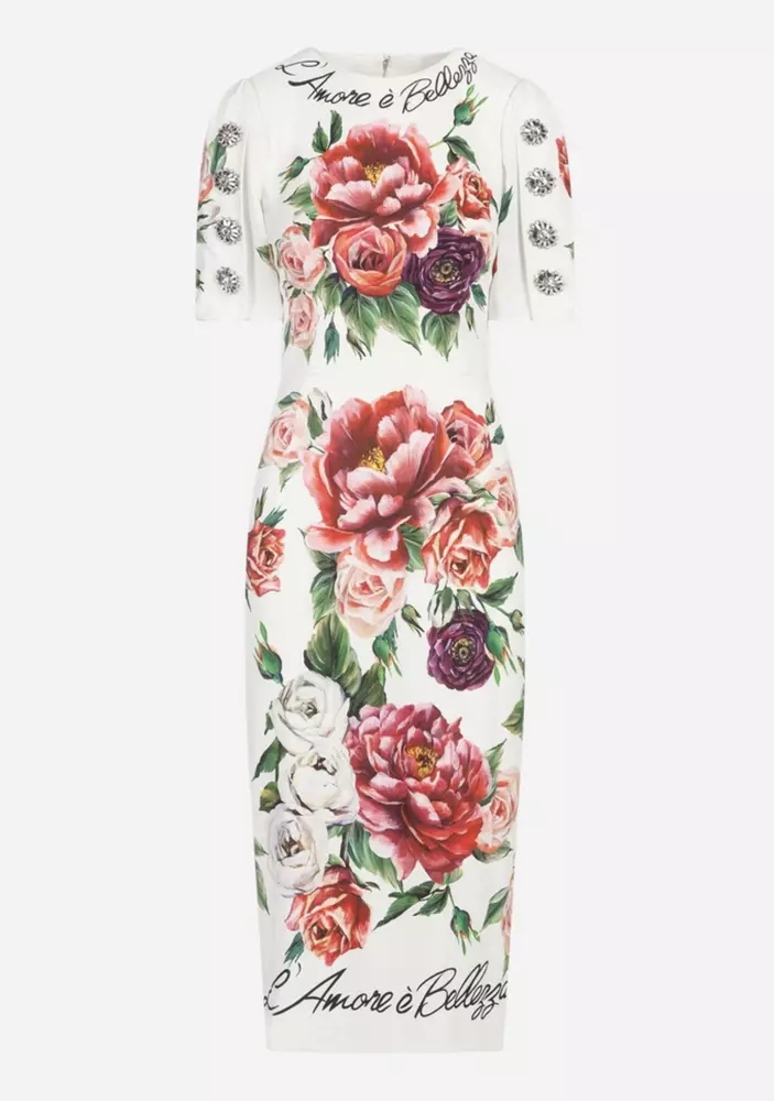 Элегантное белое платье с цветочным принтом и мерцающими акцентами Dolce & Gabbana
Элегантное белое платье с цветочным принтом и мерцающими акцентами Dolce & Gabbana