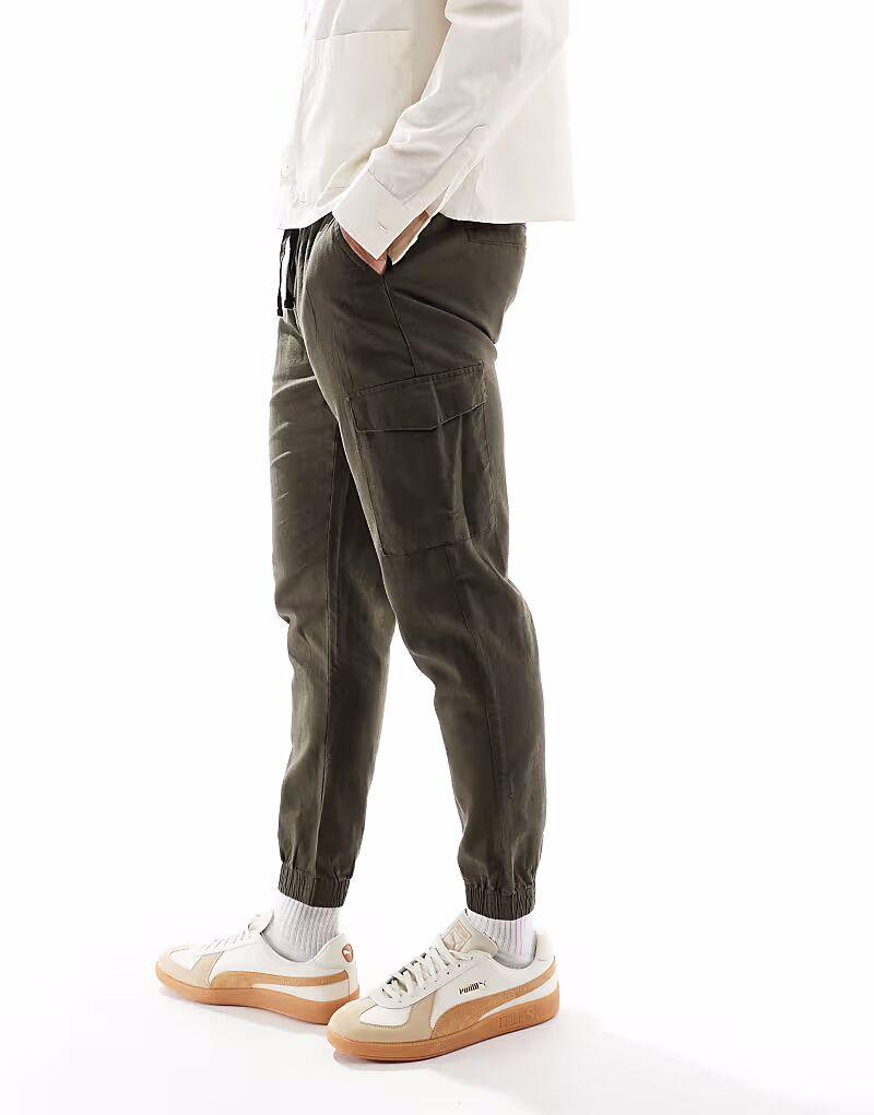 Брюки-карго Brave Soul из смеси хлопка и льна цвета хаки
Брюки-карго Brave Soul из смеси хлопка и льна цвета хаки