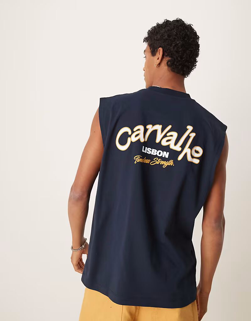 Майка ASOS DESIGN большого размера с графическим текстом города в темно-синем цвете
Майка ASOS DESIGN большого размера с графическим текстом города в темно-синем цвете