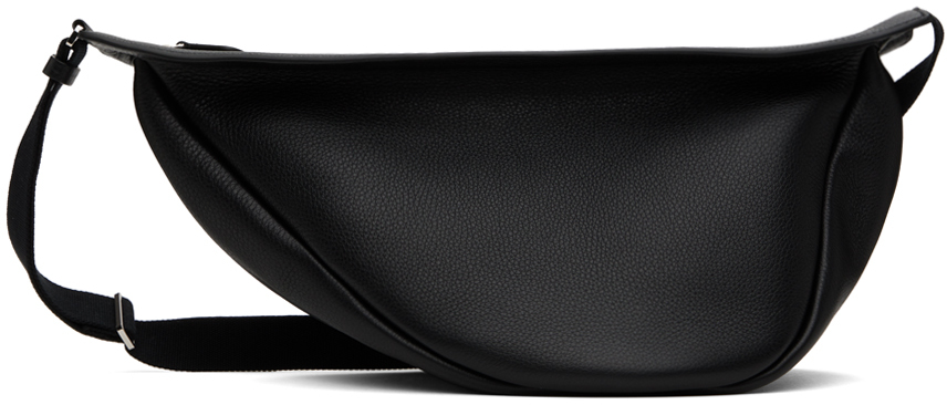 Большая накладная сумка-банан The Row
Большая накладная сумка-банан The Row