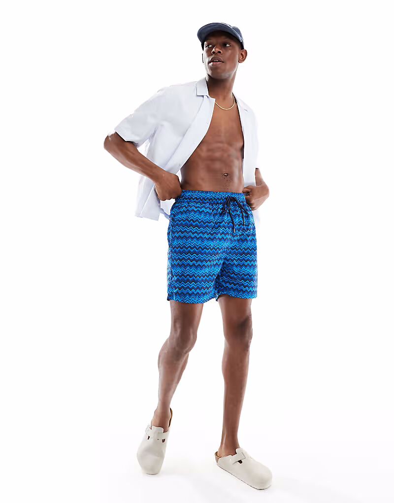 Плавки-шорты DKNY Tonga синего цвета
Плавки-шорты DKNY Tonga синего цвета