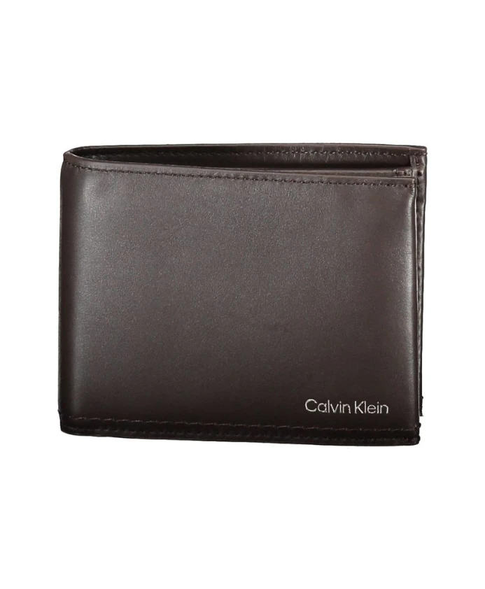 Мужской кожаный кошелек коричневого цвета с RFID-блокиратором Calvin Klein, коричневый
Мужской кожаный кошелек коричневого цвета с RFID-блокиратором Calvin Klein, коричневый