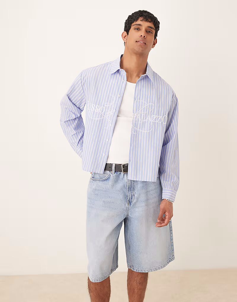 Рубашка свободного кроя в полоску с вышивкой синего цвета от ASOS DESIGN
Рубашка свободного кроя в полоску с вышивкой синего цвета от ASOS DESIGN