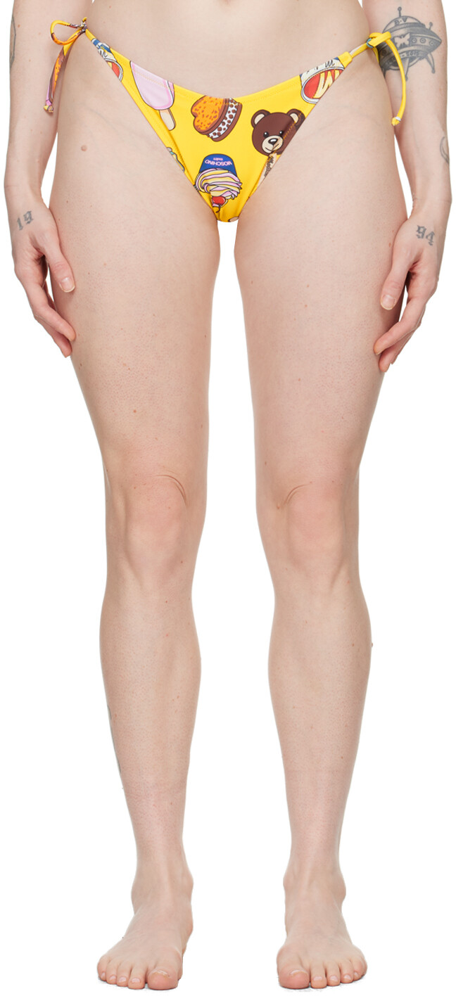 Желтые плавки бикини с принтом Moschino
Желтые плавки бикини с принтом Moschino