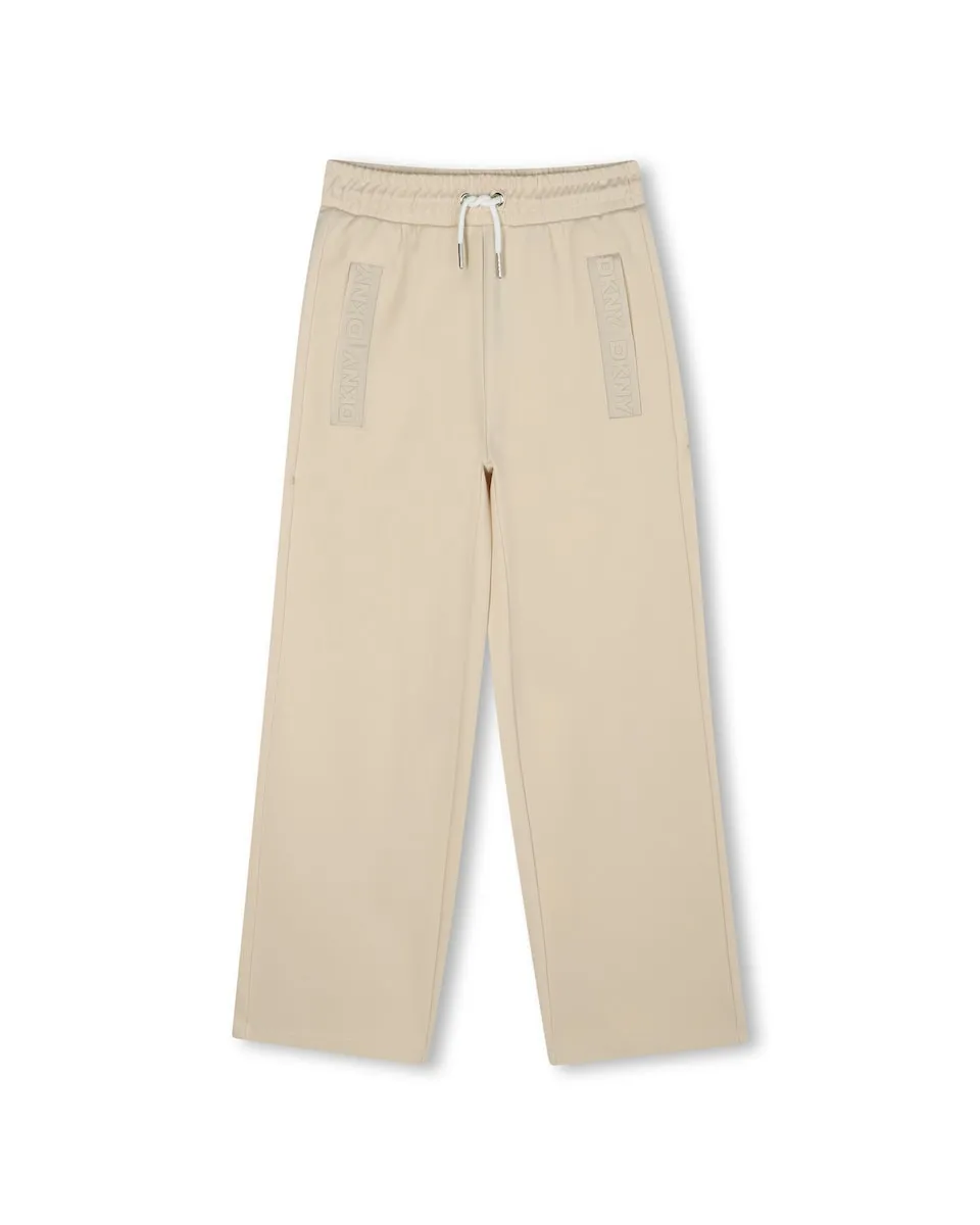 Детские одноцветные брюки DKNY
Детские одноцветные брюки DKNY