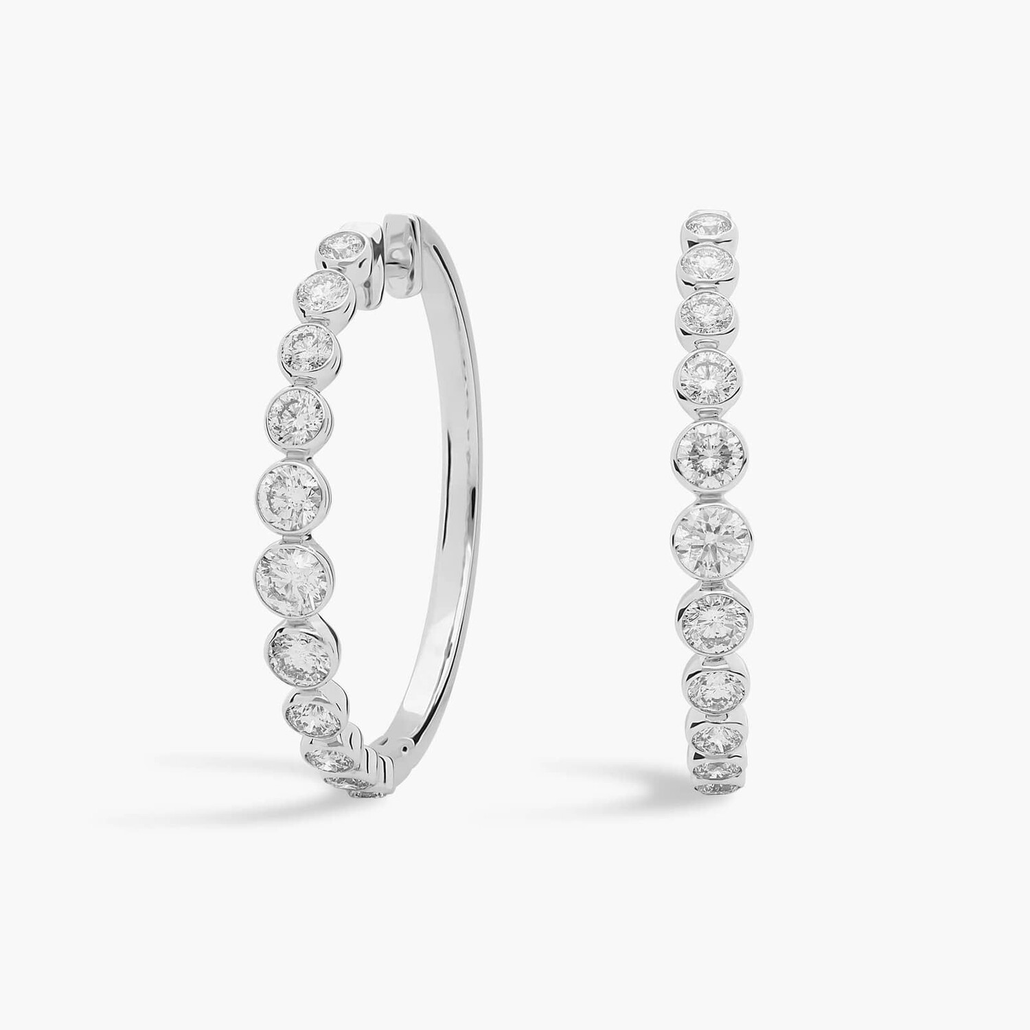 Серьги-кольца с бриллиантами в оправе с градуировкой из 14-каратного белого золота (2 карата) Blue Nile
Серьги-кольца с бриллиантами в оправе с градуировкой из 14-каратного белого золота (2 карата) Blue Nile