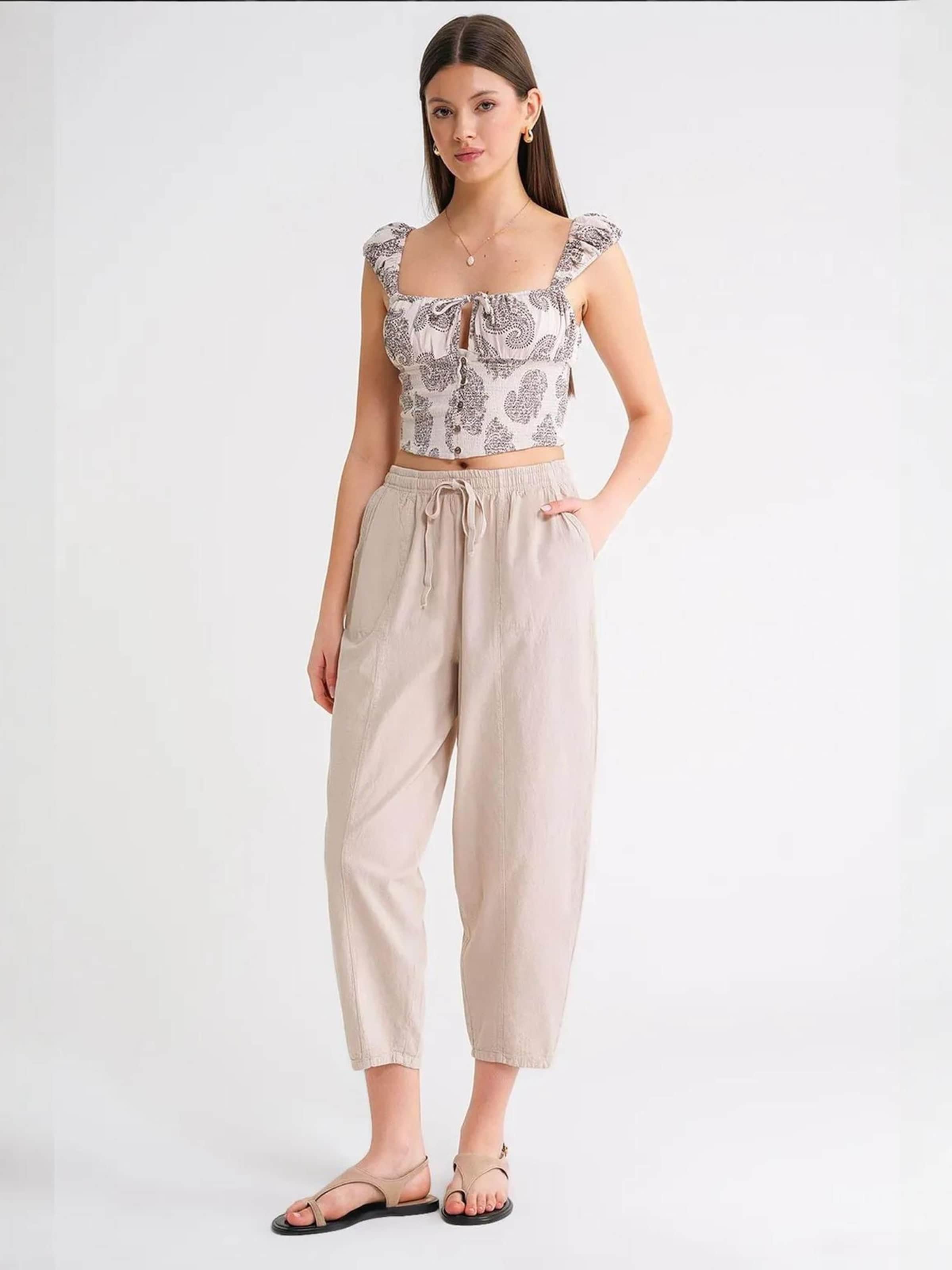 MixRay Багги-штаны в натуральном белом
MixRay Багги-штаны в натуральном белом