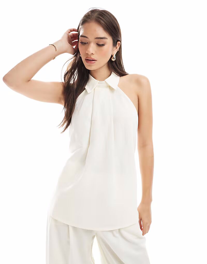 Топ с воротником-халтером ASOS DESIGN в цвете экрю
Топ с воротником-халтером ASOS DESIGN в цвете экрю