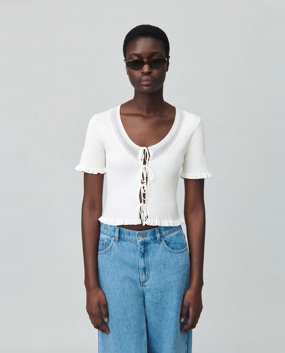 Женский топ тонкой вязки с узлом Claudie Pierlot, белый
Женский топ тонкой вязки с узлом Claudie Pierlot, белый