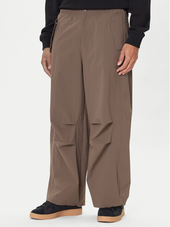 Брюки loose fit Premium Essentials Utility Parachute JW1087 Adidas, коричневый
Брюки loose fit Premium Essentials Utility Parachute JW1087 Adidas, коричневый