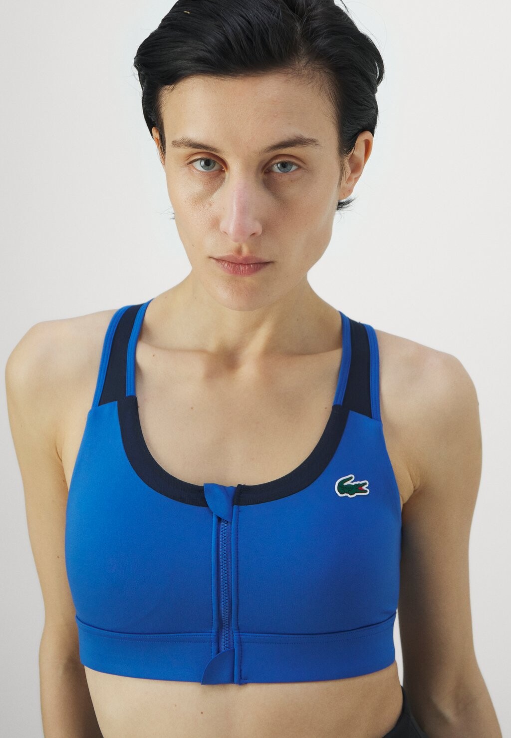 Спортивный бюстгальтер для умеренных видов спорта Active Training Bra Lacoste Sport, синий
Спортивный бюстгальтер для умеренных видов спорта Active Training Bra Lacoste Sport, синий