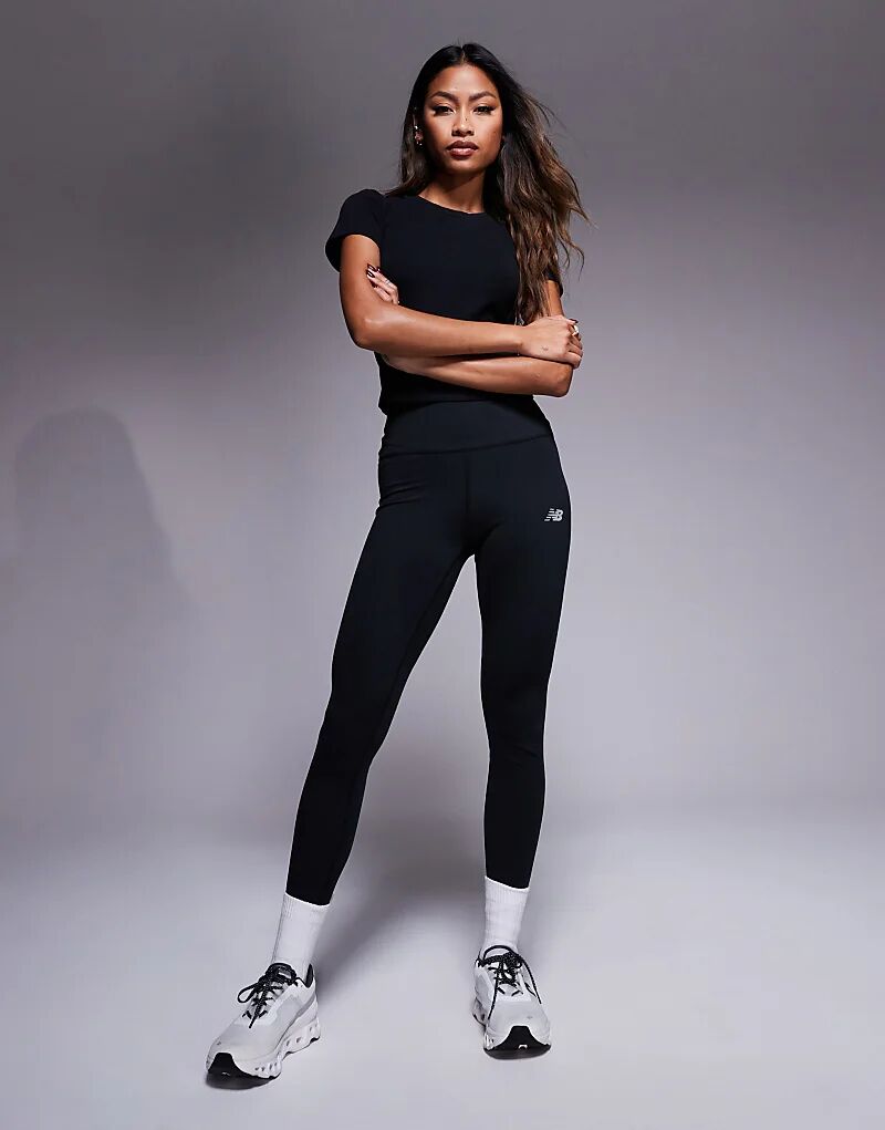 Леггинсы с высокой посадкой черного цвета New Balance
Леггинсы с высокой посадкой черного цвета New Balance