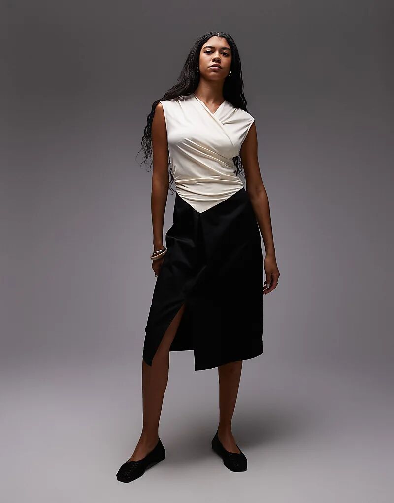 Платье миди LAAGAM Selena с драпированным эластичным лифом и приталенной юбкой в черном и бежевом цветах
Платье миди LAAGAM Selena с драпированным эластичным лифом и приталенной юбкой в черном и бежевом цветах