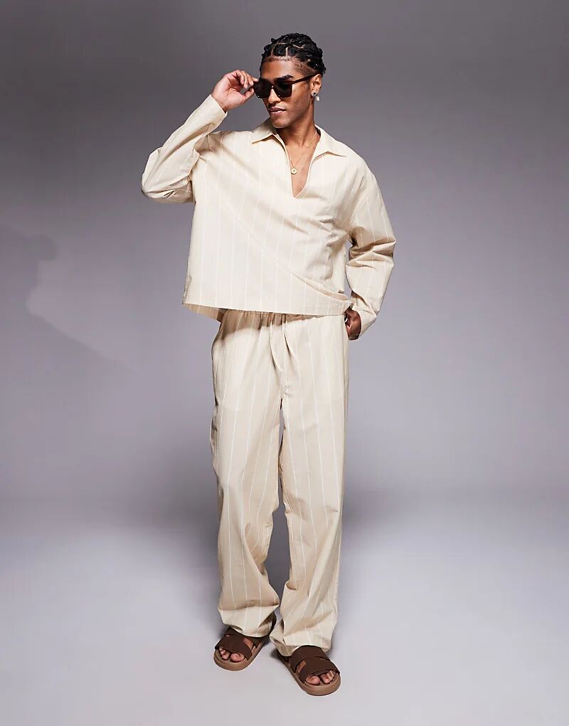 Брюки-банды в полоску от ASOS DESIGN бежевого цвета
Брюки-банды в полоску от ASOS DESIGN бежевого цвета