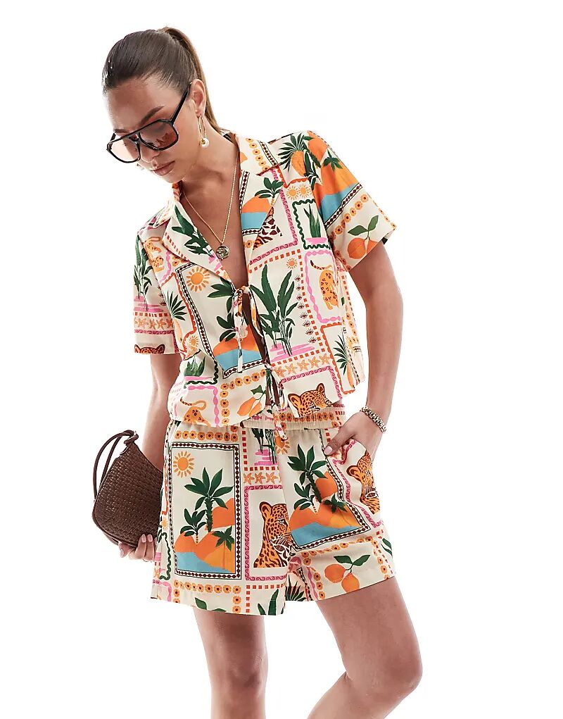 Короткие шорты Vero Moda с тропическим принтом в виде открытки
Короткие шорты Vero Moda с тропическим принтом в виде открытки