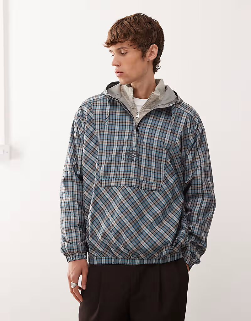 Куртка-ветровка в клетку серо-синего цвета Umbro
Куртка-ветровка в клетку серо-синего цвета Umbro