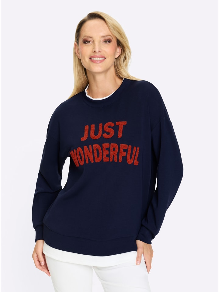 Свитер темно-синего и белого цветов Heine
Свитер темно-синего и белого цветов Heine