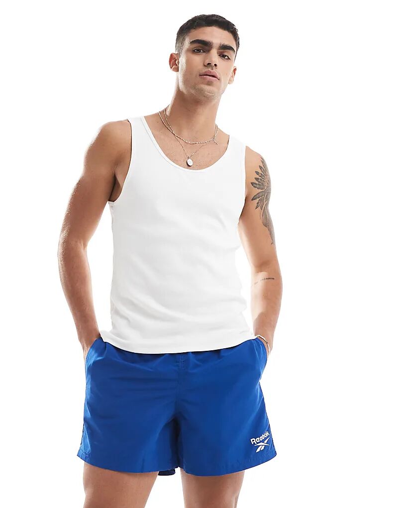 Плавки Reebok синего цвета
Плавки Reebok синего цвета