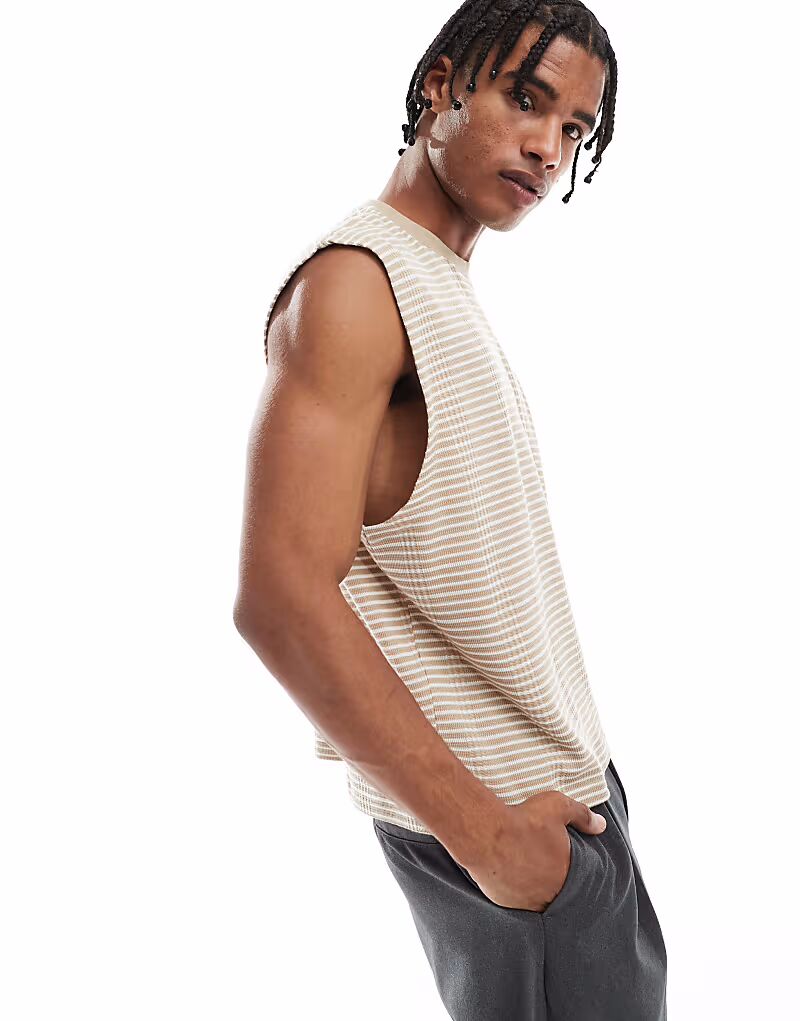 Укороченная майка ASOS DESIGN свободного кроя в полоску бежевого и белого цвета
Укороченная майка ASOS DESIGN свободного кроя в полоску бежевого и белого цвета