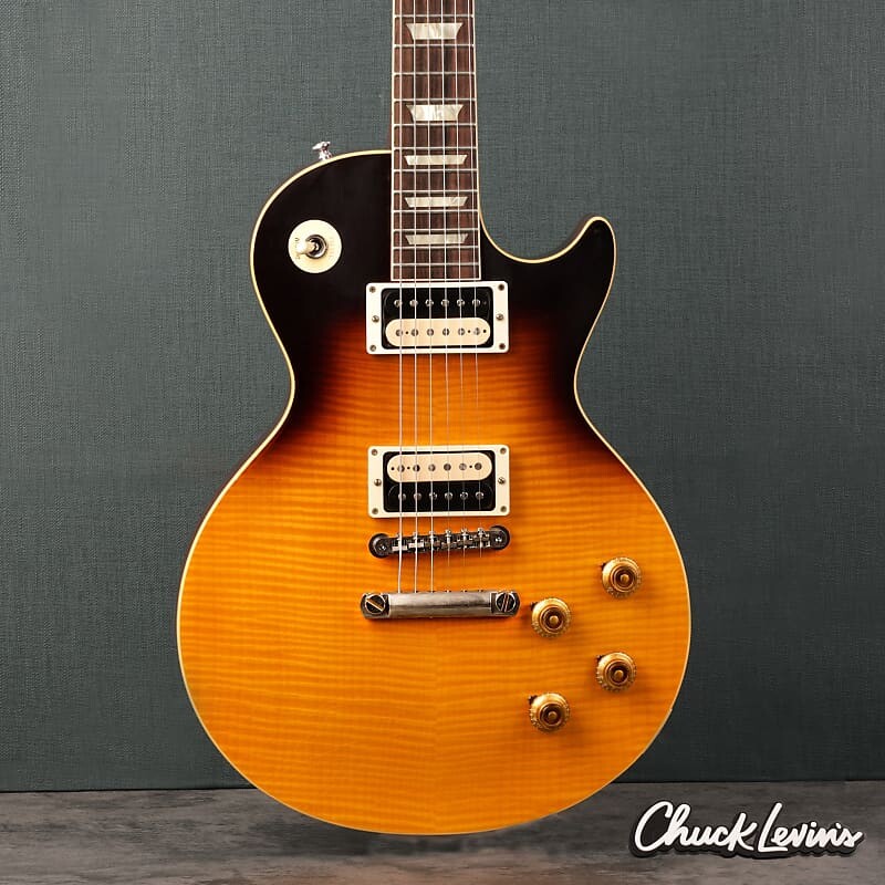 Электрогитара Gibson Murphy Lab 1959 Les Paul Standard Reissue - Ultra Light Aged Lemon Tobacco Fade - CHUCKSCLUSIVE - #922516 - Display Model
Электрогитара Gibson Murphy Lab 1959 Les Paul Standard Reissue - Ultra Light Aged Lemon Tobacco Fade - CHUCKSCLUSIVE - #922516 - Display Model