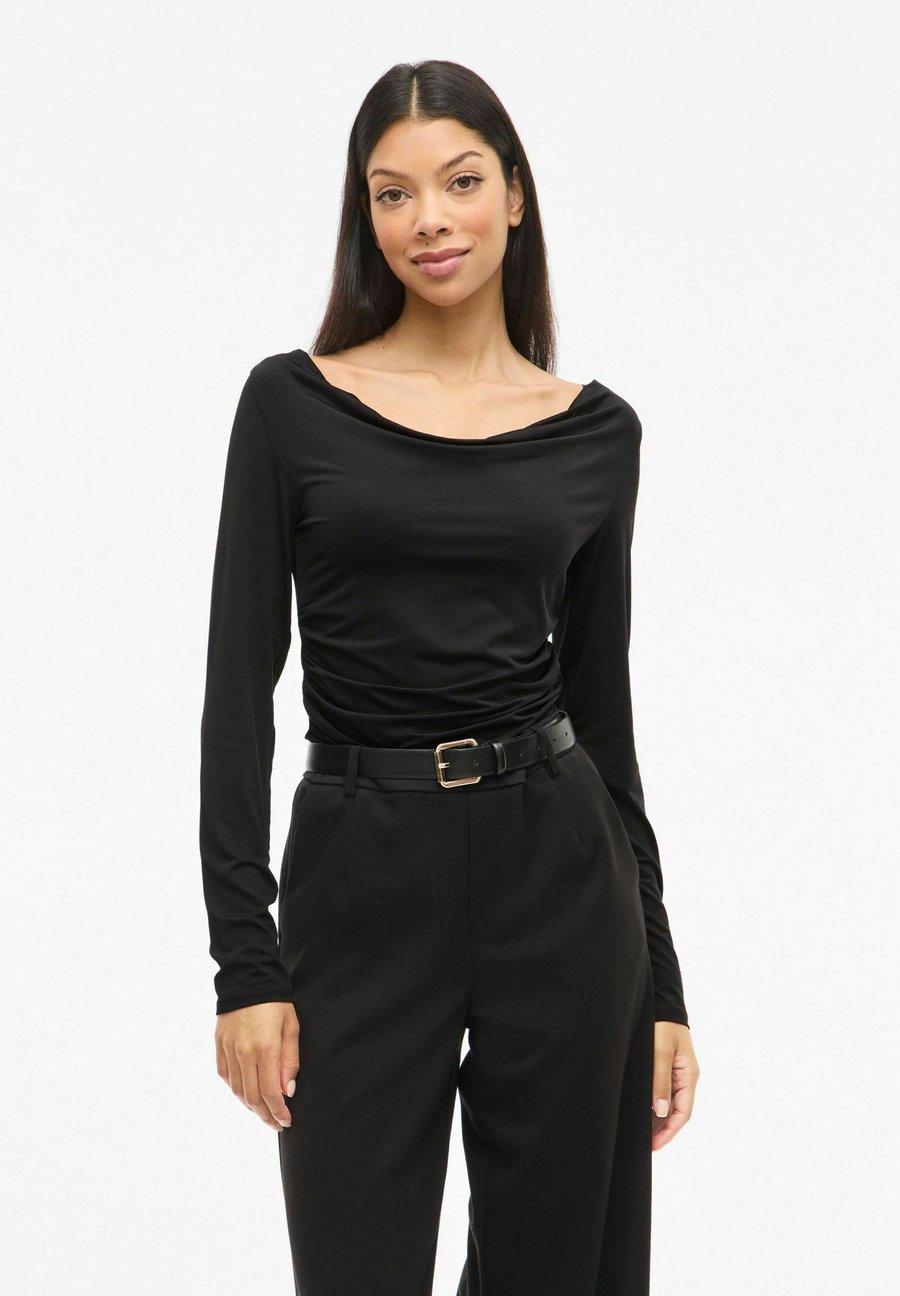 Топ VILA MIT LANGEN ÄRMELN VIKANA WASSERFALL-AUSSCHNITT, Black
Топ VILA MIT LANGEN ÄRMELN VIKANA WASSERFALL-AUSSCHNITT, Black