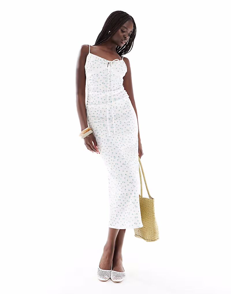 Длинное платье Pull&Bear с мелким цветочным узором белого цвета
Длинное платье Pull&Bear с мелким цветочным узором белого цвета