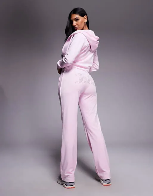 Комбинированные велюровые джоггеры с логотипом и кулиской Juicy Couture нежно-розового цвета
Комбинированные велюровые джоггеры с логотипом и кулиской Juicy Couture нежно-розового цвета