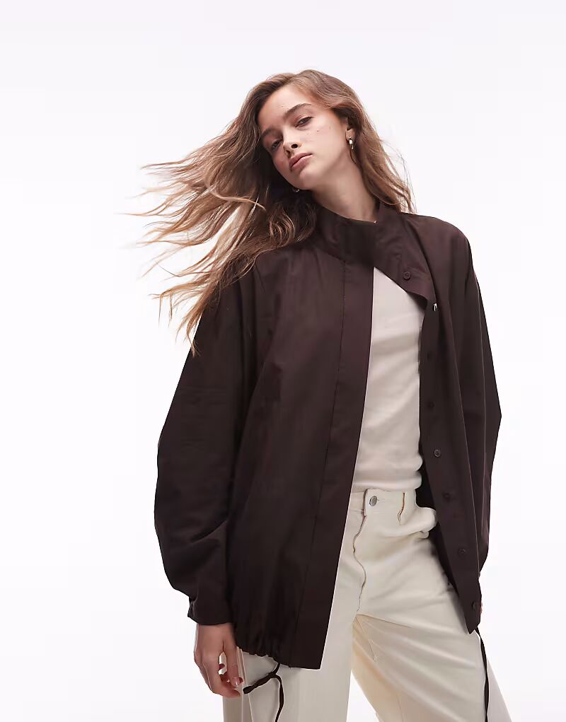 Спортивная рубашка с воротником-стойкой шоколадного цвета Asos Design
Спортивная рубашка с воротником-стойкой шоколадного цвета Asos Design