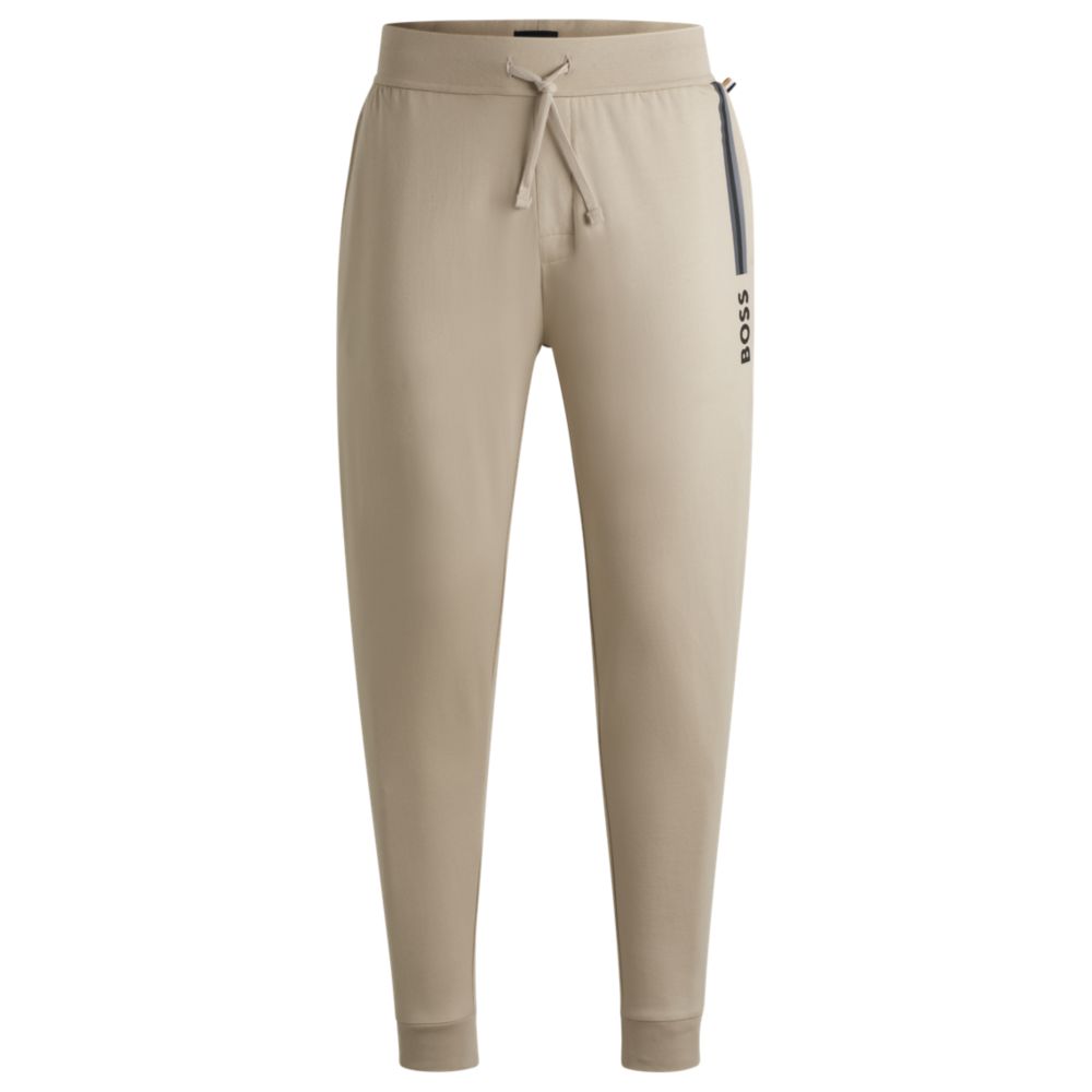 Спортивные брюки на шнурке из хлопчатобумажной махровой ткани с логотипом BOSS, светло-бежевый
Спортивные брюки на шнурке из хлопчатобумажной махровой ткани с логотипом BOSS, светло-бежевый