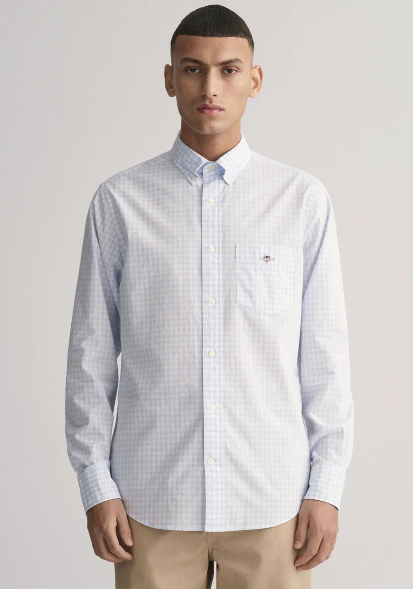 Рубашка Gant с длинными рукавами "REG POPLIN GINGHAM SHIRT" и вышитым логотипом на груди, голубой
Рубашка Gant с длинными рукавами "REG POPLIN GINGHAM SHIRT" и вышитым логотипом на груди, голубой