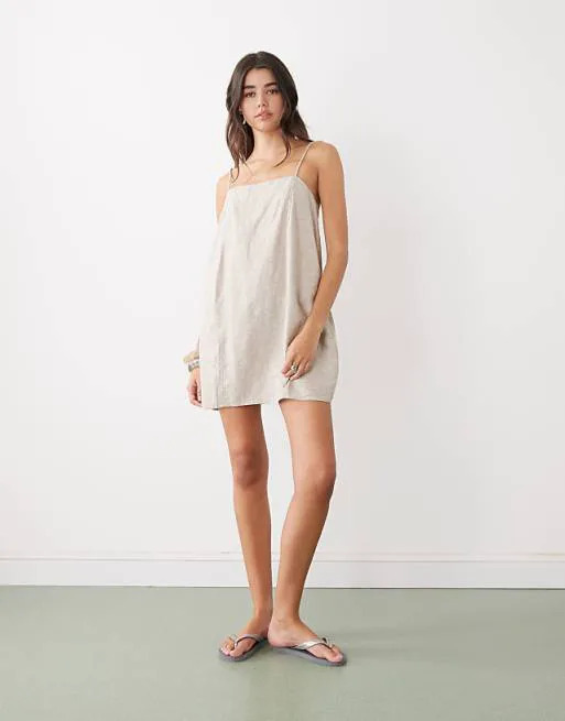 Бежевое льняное платье мини Monki
Бежевое льняное платье мини Monki