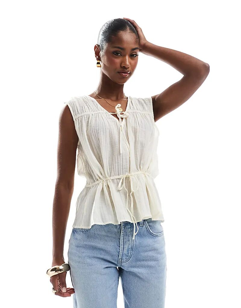 Топ со сборками и завязками спереди, песочного цвета
Топ со сборками и завязками спереди, песочного цвета