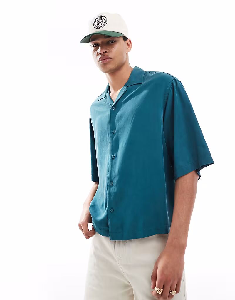 Рубашка свободного кроя ASOS DESIGN свободного кроя Revere бирюзового цвета
Рубашка свободного кроя ASOS DESIGN свободного кроя Revere бирюзового цвета