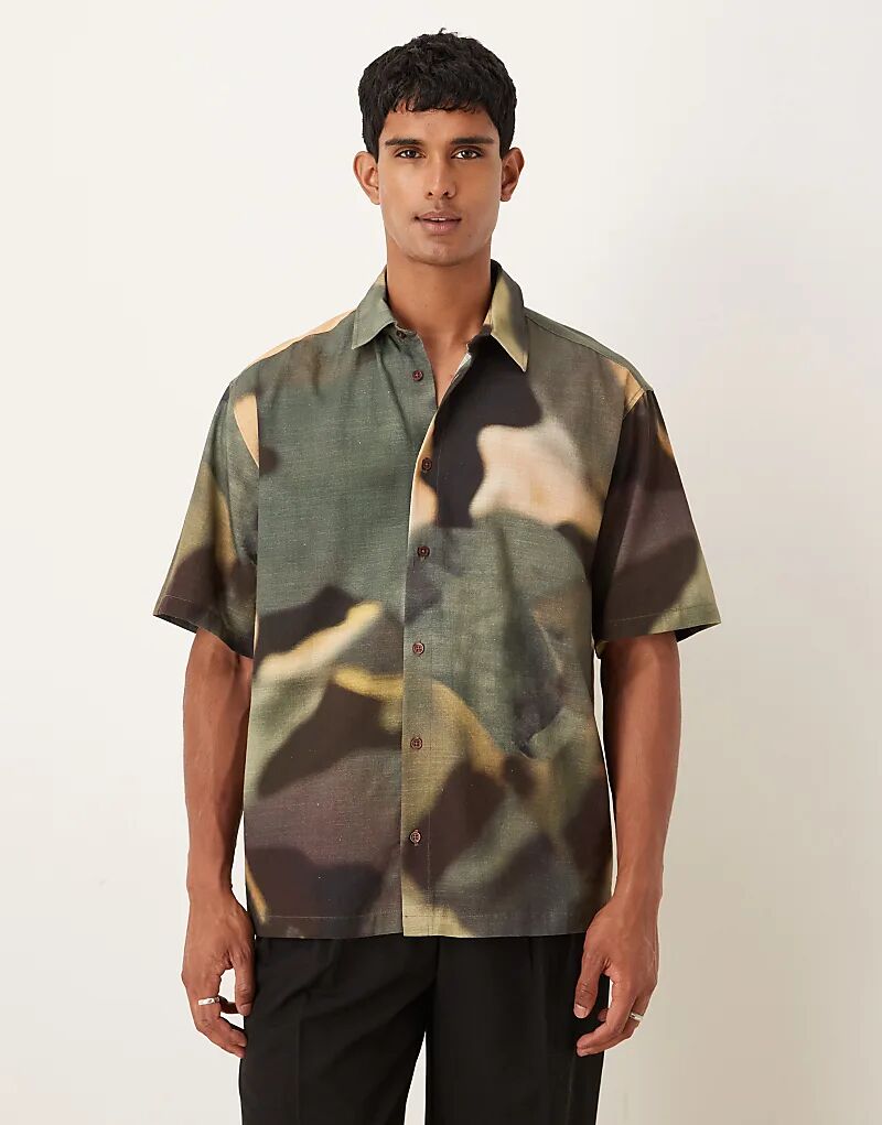 Рубашка свободного кроя ASOS DESIGN цвета хаки с абстрактным принтом
Рубашка свободного кроя ASOS DESIGN цвета хаки с абстрактным принтом