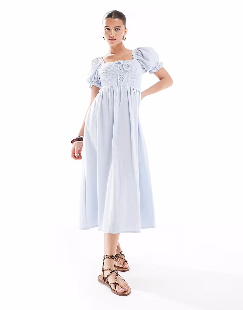 Платье миди New Look с завязками спереди и сборками синего цвета
Платье миди New Look с завязками спереди и сборками синего цвета