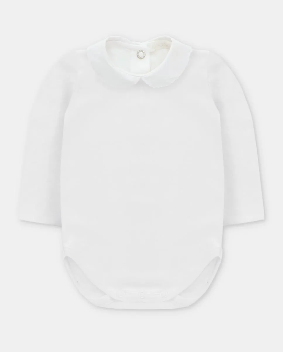 Боди для младенца из интерлока белого цвета с окантовкой на воротовой части Martín Aranda
Боди для младенца из интерлока белого цвета с окантовкой на воротовой части Martín Aranda