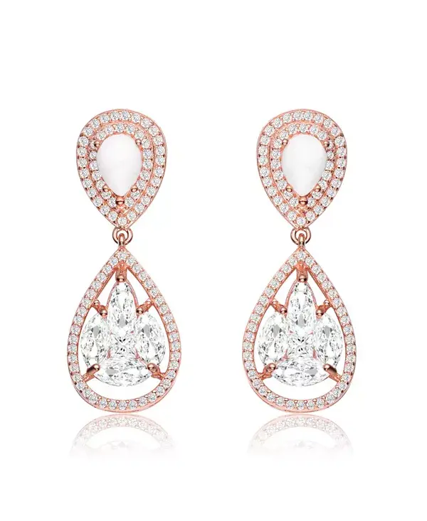 Серьги-Подвески с покрытием из 18-каратного розового золота, прозрачными кубическими цирконами и говлитом Genevive, rose
Серьги-Подвески с покрытием из 18-каратного розового золота, прозрачными кубическими цирконами и говлитом Genevive, rose