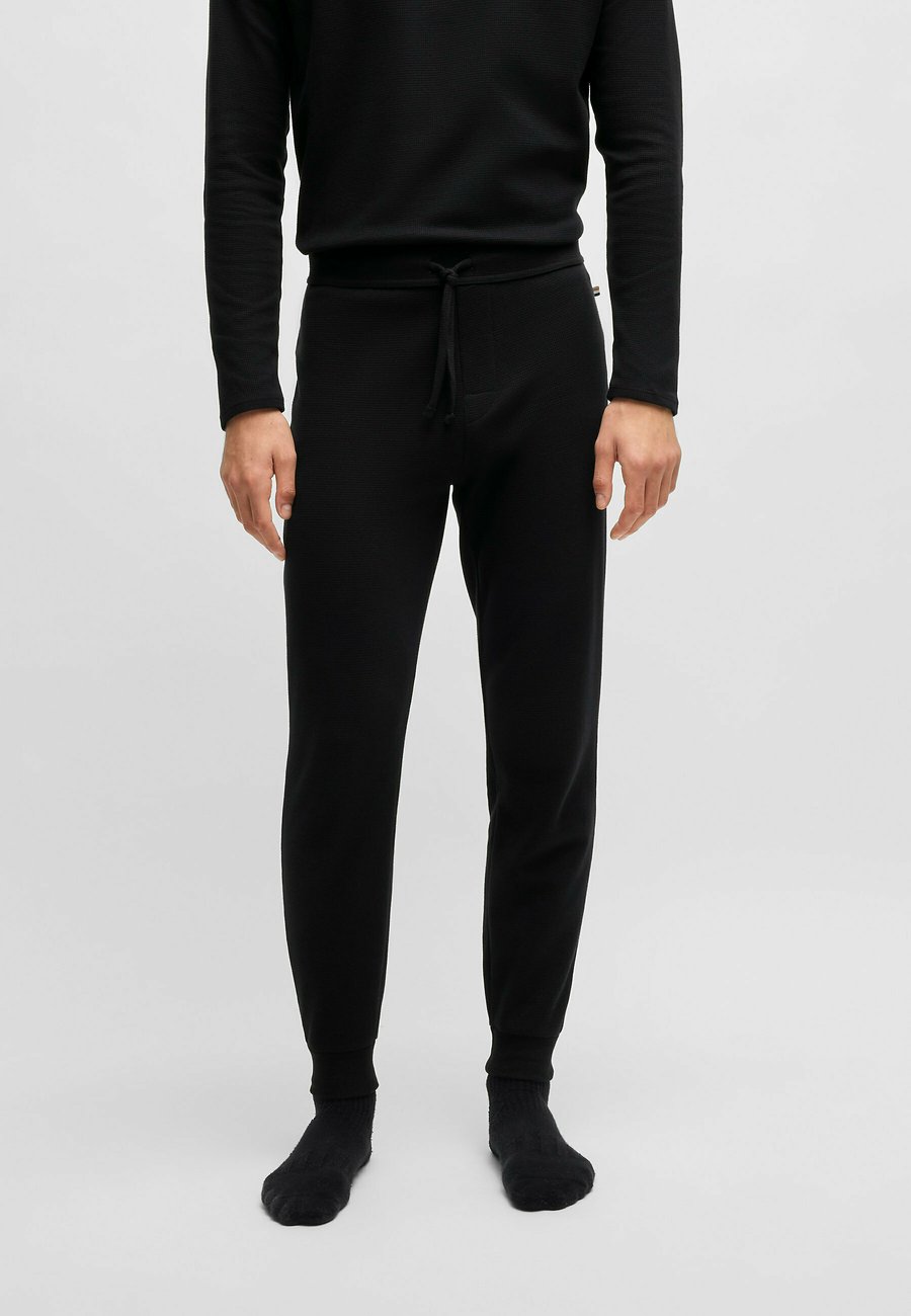 Пижамные брюки BOSS WAFFLE CUFF, Black One/Black
Пижамные брюки BOSS WAFFLE CUFF, Black One/Black
